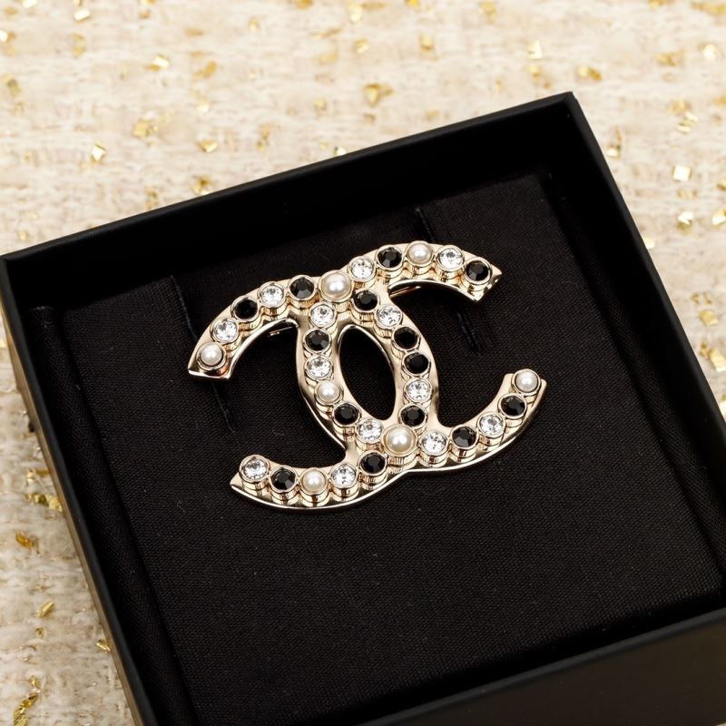 Ch*el brooches